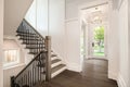 An entryway and entrance of a beautiful new construction home. Royalty Free Stock Photo