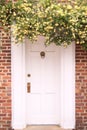 Entryway framed with flowers