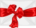 Envelope with a big red bow and ribbon Royalty Free Stock Photo