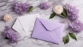 envelope lilac for wedding invitation on marble background with flowers Royalty Free Stock Photo