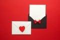 Envelope Mail, Heart and Ribbon on red Background. Valentine Day Card, Love or Wedding Greeting Concept. Top view Royalty Free Stock Photo