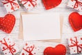 Envelope Mail with Red Heart and gift box over White Wooden Background. Valentine Day Card, Love or Wedding Greeting Concept Royalty Free Stock Photo