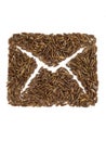 Envelope, mail sign made of brown rice grains on an isolated white background. Royalty Free Stock Photo