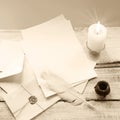 Envelope and paper on white wooden table