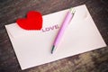 Envelope and pen with heart Royalty Free Stock Photo