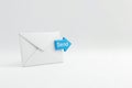 Envelope with a send button on a white background. Space for text. Royalty Free Stock Photo