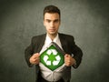 Enviromentalist business man tearing off shirt with recycle sign Royalty Free Stock Photo