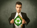 Enviromentalist business man tearing off shirt with recycle sign Royalty Free Stock Photo