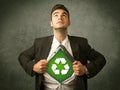 Enviromentalist business man tearing off shirt with recycle sign Royalty Free Stock Photo