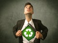 Enviromentalist business man tearing off shirt with recycle sign Royalty Free Stock Photo