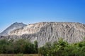 Environmantal impact of quarrying shown soil erosion from mountain