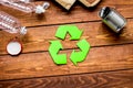 environment concept with recycling symbol on wooden background top view mock up Royalty Free Stock Photo