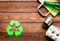 Environment concept with recycling symbol on wooden background top view mock up Royalty Free Stock Photo