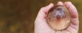 World earth day. Hands are holding a glass planet. Royalty Free Stock Photo