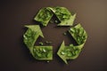 Recycling sign made from green leaves. Generative AI Royalty Free Stock Photo