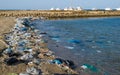 Environment of the Red Sea, Mountains of garbage on the beach away from the resort towns of Marsa Alam, Egypt Royalty Free Stock Photo