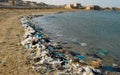 Environment of the Red Sea, Mountains of garbage on the beach away from the resort towns of Marsa Alam, Egypt Royalty Free Stock Photo