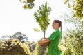 Environmental activist about to plant tree