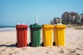 Environmental care Four plastic containers for garbage sorting on beach