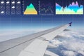 Environmental climate symbol with graph and chart on wing and engine of aircraft on blue sky and white clouds  for meteorology and Royalty Free Stock Photo