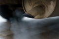 Exhaust gases come out of the car`s exhaust pipe - CO2 Royalty Free Stock Photo