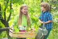 Environmental conservation concept. Cute toddler girl and boy working on farm outdoors. Childhood concept. Children