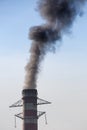 Environmental Damage: Air Pollution. The black smoke of the pipe Royalty Free Stock Photo