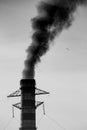 Environmental Damage: Air Pollution. The black smoke of the pipe Royalty Free Stock Photo