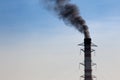 Environmental Damage: Air Pollution. The black smoke of the pipe Royalty Free Stock Photo