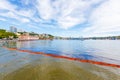 Summer, 2016 - Vladivostok, Russia - Environmental disaster. Spill of oil products into the sea. Dirty water area of the Golden
