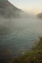 Environmental Friendly Outdoor Activity, Floating with Bamboo Rafting in the morning in the pretty serene lake Royalty Free Stock Photo