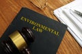 Environmental law book with stack of papers Royalty Free Stock Photo