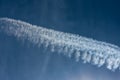 Blue sky with chemtrails or contrails Royalty Free Stock Photo