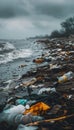 Environmental pollution trash litters seashore, providing ample space for text placement Royalty Free Stock Photo