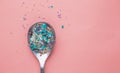 Environmental pollution and water microplastic. Micro plastic with spoon Royalty Free Stock Photo