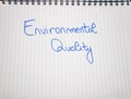 Environmental quality handwriting text on paper, on office agenda. Copy space