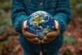 Environmentalist Holding the Planet Earth Globe in Hands extreme closeup. Generatie AI