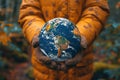 Environmentalist Holding the Planet Earth Globe in Hands extreme closeup. Generatie AI