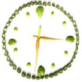 Vegetarian diet of vegetables in the form of clocks, green onions, carrots, Basil and peas on a white background.