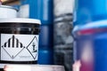 `Environmentally hazardous` placard warning sign on chemical box. Royalty Free Stock Photo