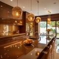 The kitchen cabinets sleek and modern, are finished in a rich caramel tone.. Royalty Free Stock Photo