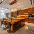 Open-concept kitchen and dining area where the warmth of caramel envelops the space,