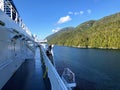 Eople admiring the beautiful blue ocean along the BC ferries inside passage route on the British Columbia coast , Canada.