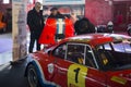 eople looking at a Alpinche rally car during the vintage and classic car exhibition, ClassicMadrid, in Madrid, Spain Royalty Free Stock Photo