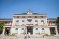 Eople passing by the Mairie d Annemasse City Hall, a major landmark of the city, in Haute Savoie, by the swiss border.