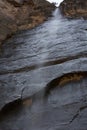 Ephemeral Weeping Waterfall Over Dark Sandstone Cliff Face at Zion National Park in Utah Royalty Free Stock Photo