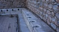 Ephesus Latrines in the ruin of ancient Roman City of Ephesus in Selcuk, Turkey.