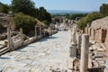 EPHESUS, TURKEY - AUGUST 16, 2017: Curetes Street in Ephesus ancient city, Selcuk, Turkey. Hercules Gate