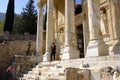 Tourist posing in front of the Library of Celsus in Ephesus