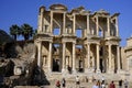 Tourists in front of the ruins of the Library of Celsus